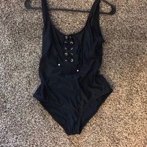 Black lace up one piece swim suit